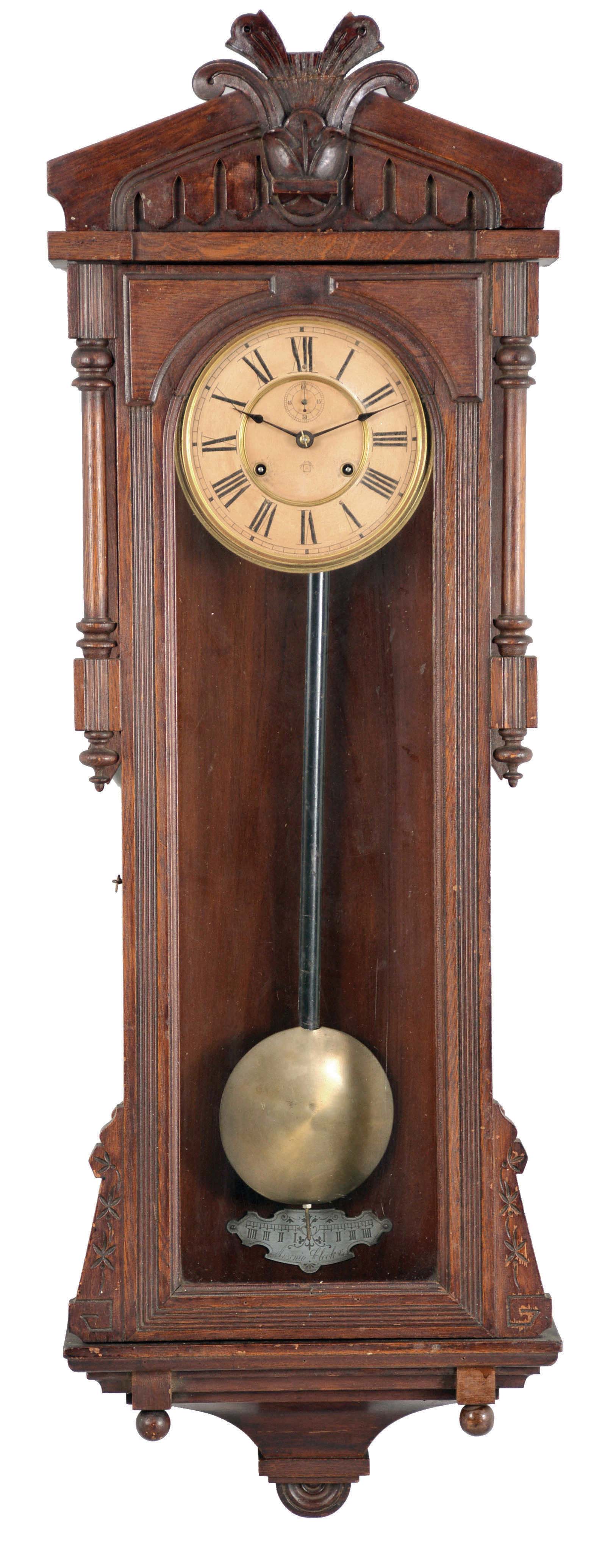 Ansonia Clock Co., New York, NY, "Bagdad" wall hanging clock with a spring driven, 8 day double wind timepiece movement in an oak case. — Antique Clocks Price Guide