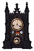 Unsigned Gothic style iron front shelf clock, attributed to the American Clock Co., NYC, with a 30 hour spring driven time and strike movement in a painted iron case with MOP inlay.