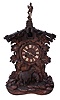 Germany, 8 day, shelf cuckoo, time and strike fusee movement with wooden plates and brass wheels, in a finely carved case, possibly by Ketterer.
