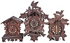 Clocks- 11 (Eleven) antique and modern cuckoo clocks for parts or repair and 2 (Two) cuckoo clock cases including a shelf cuckoo and a carved case from the American Cuckoo Clock Co. depicting the fable of the fox and the grapes. Clock weights include 4 (Four) modern sets and 1 (one) older pair.