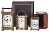 Carriage clocks- 3 (Three): including a "Matthew Norman" with oval case and original outer box, another with gilt case and decorative white enamel dial, and a Waterbury miniature with outer case