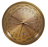 Le Coultre & Co., Switzerland, model 482 "World Time" desk clock, gilt case with convex glass, gilt dial with 34 cities around perimeter, and also with date display at 6:00, 8 day timepiece movement