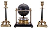 Franklin Mint/ Royal Geographical Society globe clock, ebonized base with slender columns at corners supporting an equatorial plate, turned brass clock case with annular dial supporting a terrestrial globe, 8 day Imhof movement, together with a pair of Empire style candlesticks with tripod bases, clock dimensions listed