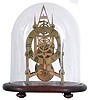 England, small Gothic skeleton clock, the pierced brass frame with 6 turned baluster form pillars, engraved Roman numeral brass dial, blued steel hands, and 8 day fusee timepiece movement, mounted to an oval mahogany base with glass dome.
