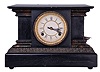 Waterbury Clock Co., Waterbury, Conn., "Dakota", 8 day, time and strike spring driven, lever movement black mantel clock. These clocks were bought by The Loheide Mfg. Co. and modified and sold as a "Trade Stimulator", - a gambling clock.