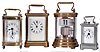 Carriage clocks- 4 (Four): One Waterbury time and strike with hour repeating, brass case with beveled glasses, Roman numeral white enamel dial, a "Plato" clock made in Germany for the Horolovar Clock Co. with brass case, and two German carriage clocks, both timepiece with alarm, one with brass case and beveled glasses, Arabic numeral silvered dial, the other with nickel plated case and Arabic numeral enamel dial, dimensions of Waterbury listed