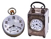 Clocks- 2 (Two): The first a silver cased carriage style clock, with London hallmark, and date letter for the year 1905, Roman numeral white enamel dial, blued steel hands, and 8 day French timepiece movement with lever platform, the other an "Octavia Watch Co." Swiss movement paperweight clock, Arabic numeral white enamel dial, brass hands, and 8 day timepiece movement, first clock dimensions listed