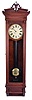 New York Standard Watch Co., Jersey City, New Jersey, electric hanging regulator, walnut case with molded door and base, Roman numeral painted dial with brass bezel, in line movement with Hipp toggle, pendulum with ebonized wooden rod and heavy brass clad ball