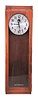 Stromberg Time Corporation, New York, NY, electric master regulator wall clock, time only movement marked "6957M" with deadbeat escapement in a mahogany case with silvered metal dial, patent date 1941