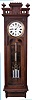 Wm. L. Gilbert Clock Co., Winsted, Conn., "Regulator No. 18", jeweler's regulator wall clock, the mahogany case with burl mahogany panel, Roman numeral white enamel dial, blued steel hands, 8 day, time only, weight driven movement with three jar mercury pendulum, deadbeat escapement and maintaining power