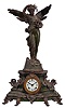 Ansonia Clock Co., New York, NY, "Undine and Gloria" figural mantel shelf clock with a spring driven, 8 day time and half hour strike movement in a cast metal case.