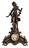 Seth Thomas Clock Co., Thomaston, Conn., "Vivien" figural mantel clock with a spring driven 15 day time and half hour strike movement in a cast metal and Brazilian Onyx case.