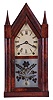 Brewster and Ingrahams, Bristol, Conn., 8 day, time and strike spring driven movement sharp gothic or steeple clock with brass springs.