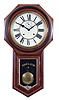 Ansonia Clock Co., New York, NY, "Regulator A" hanging clock with a spring driven, 8 day, time and strike movement in a walnut case.
