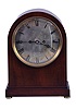 Winterhalder & Hofmeier, Schwarzenbach, Germany, 8 day double fusee Westminster chime movement in a rounded Gothic style case on bun feet, with round silvered brass dial showing Roman numerals, c1900.