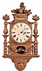 Sweden, a large, carved and gilt cartel clock, the case decorated with classically inspired ornament, Roman numeral white painted dial with cast brass bezel, ornate pierced and chased hands, spring powered, 8 day, time and strike movement with silk thread suspension