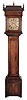 Peter Stretch, Philadelphia, 18th century tall clock, walnut case with caddy top above a deep, cavetto molded cornice, bonnet door with attached, turned columns, trunk with thumb molded, figured walnut door, and heavy ogee moldings at top and bottom, and the base with removable panel, feet cut from the front and sides, the square, composite dial with gilt, matted center, decorated winding holes, and Roman numeral, silvered chapter ring, pierced steel hands, 8 day, weight driven time and strike movement with count wheel between the plates, brass pendulum with wooden rod, and cylindrical lead weights