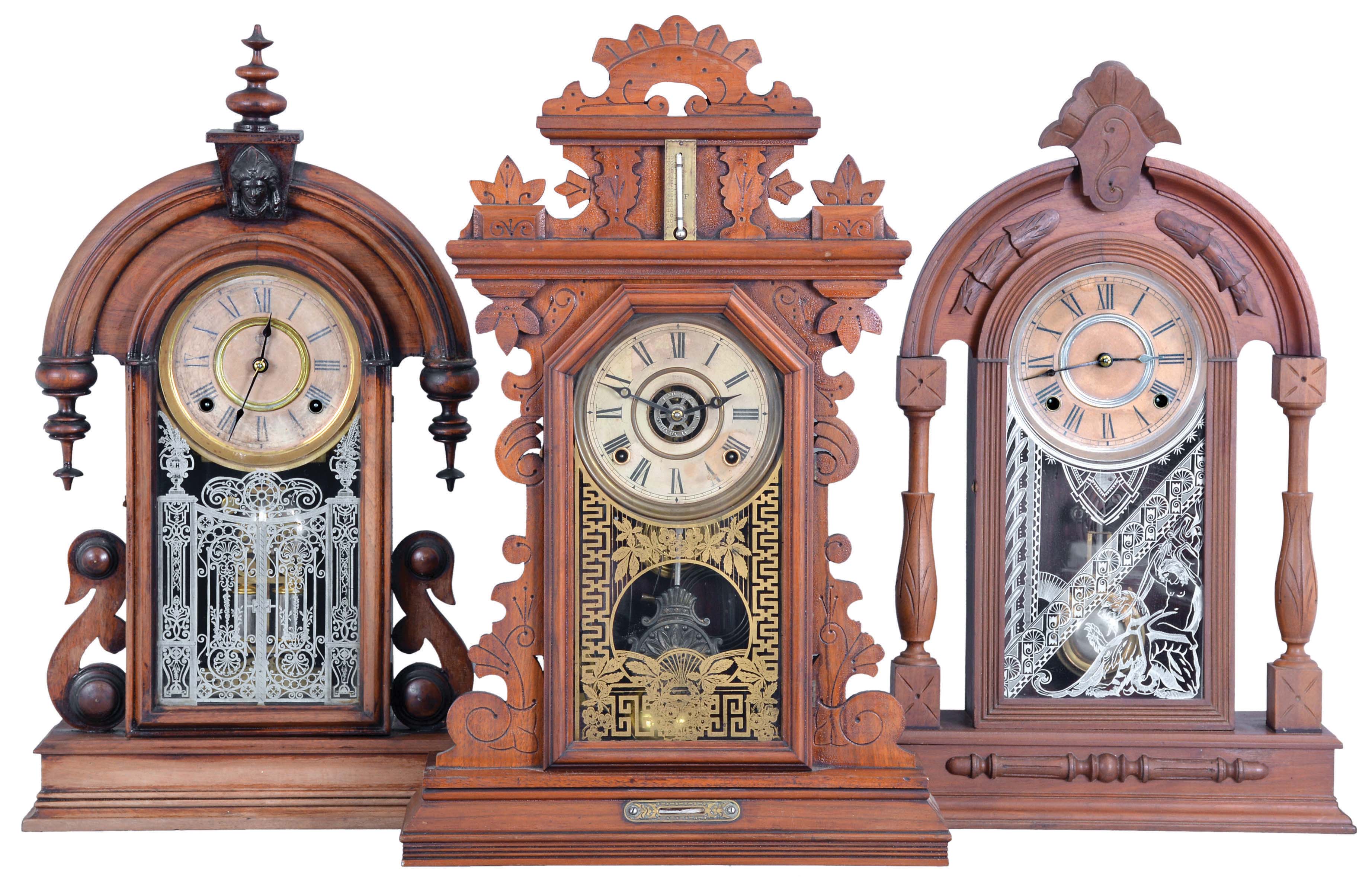 Clocks- 3 (Three): (1) Ansonia Clock Co., New York, "Parisian" shelf clock with a spring driven, 8 day, time and strike movement in a walnut case, c1880; (2) William L. Gilbert Clock Co., Winsted, Conn., "Texas" shelf clock with a spring driven, 8 day, time and strike movement in a walnut case, c1881. (3) E. Ingraham & Co., Bristol, Conn., premium model shelf clock with a spring driven, 8 day time, strike & alarm movement in a walnut case with a thermometer & level, c1880. — Antique Clocks Price Guide