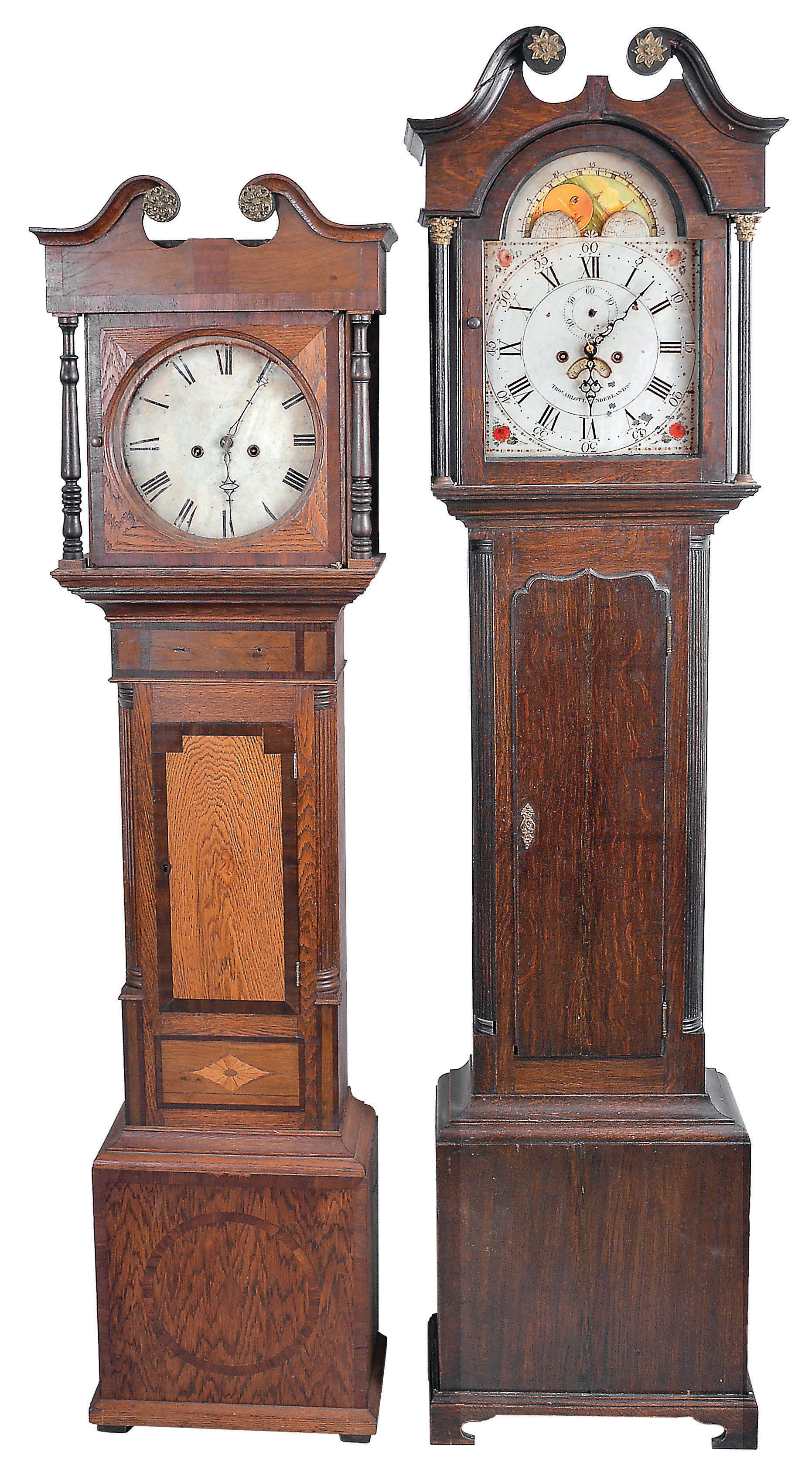 Tall Clocks- 2 (Two) English oak broken arch cases, no weights nor pendulums: (1) Thomas Arlott, Sunderland, 8 day, time and strike, weight driven movement with painted metal dial, moon phase and calendar, circa 1820; (2) 8 day, time and bell strike weight driven movement with a painted metal dial — Antique Clocks Price Guide