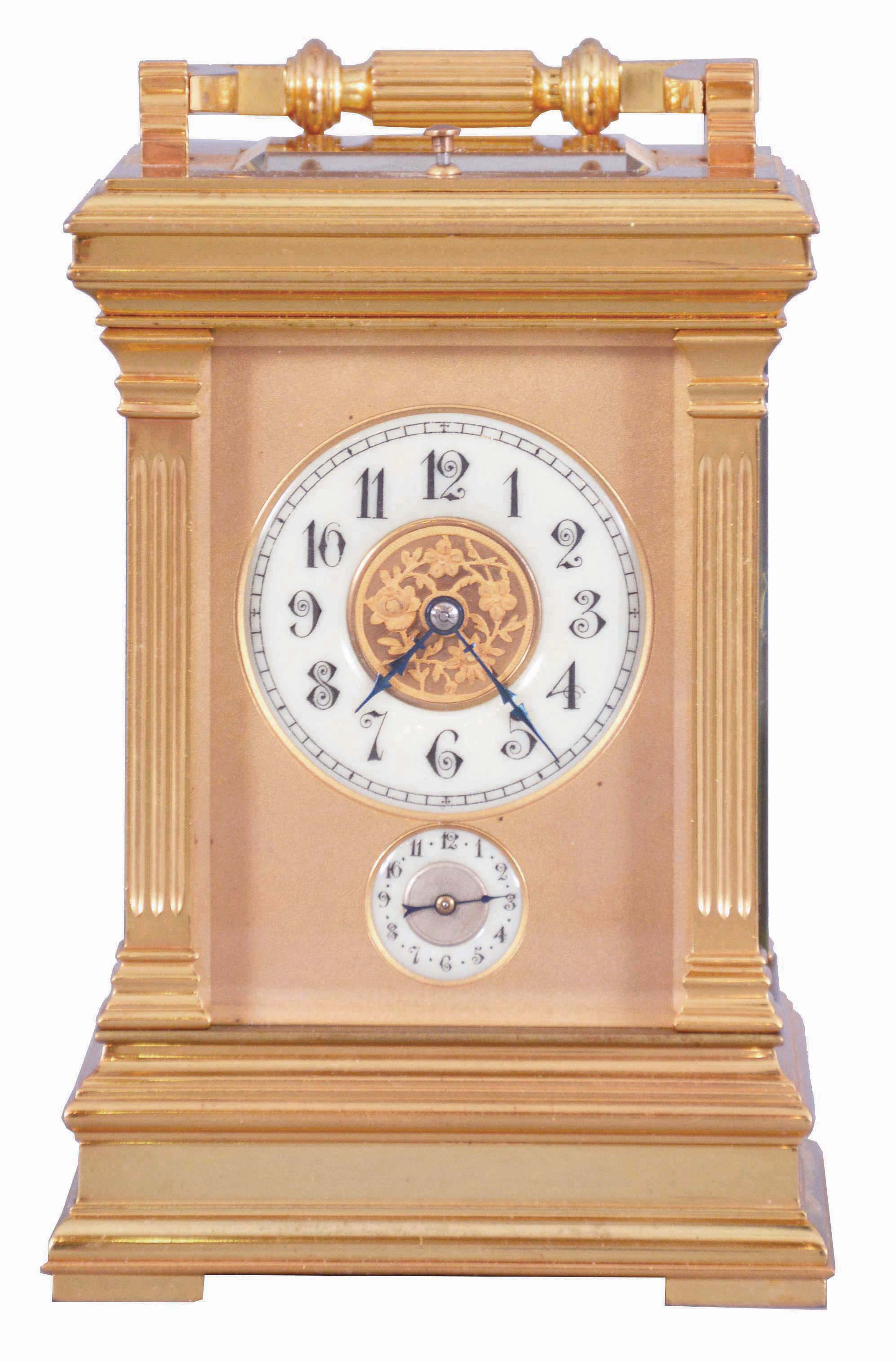 France, a large, Anglaise cased carriage clock with grand sonnerie striking, the glazed, gilt case with molded top and base, the corners with fluted pilasters, Arabic numeral white enamel dial with gilt center and mask, blued steel distaff hands, 8 day time, strike, and alarm movement with lever platform, sounding grand or petit quarters in passing, and repeating the last hour and quarter on demand — Antique Clocks Price Guide
