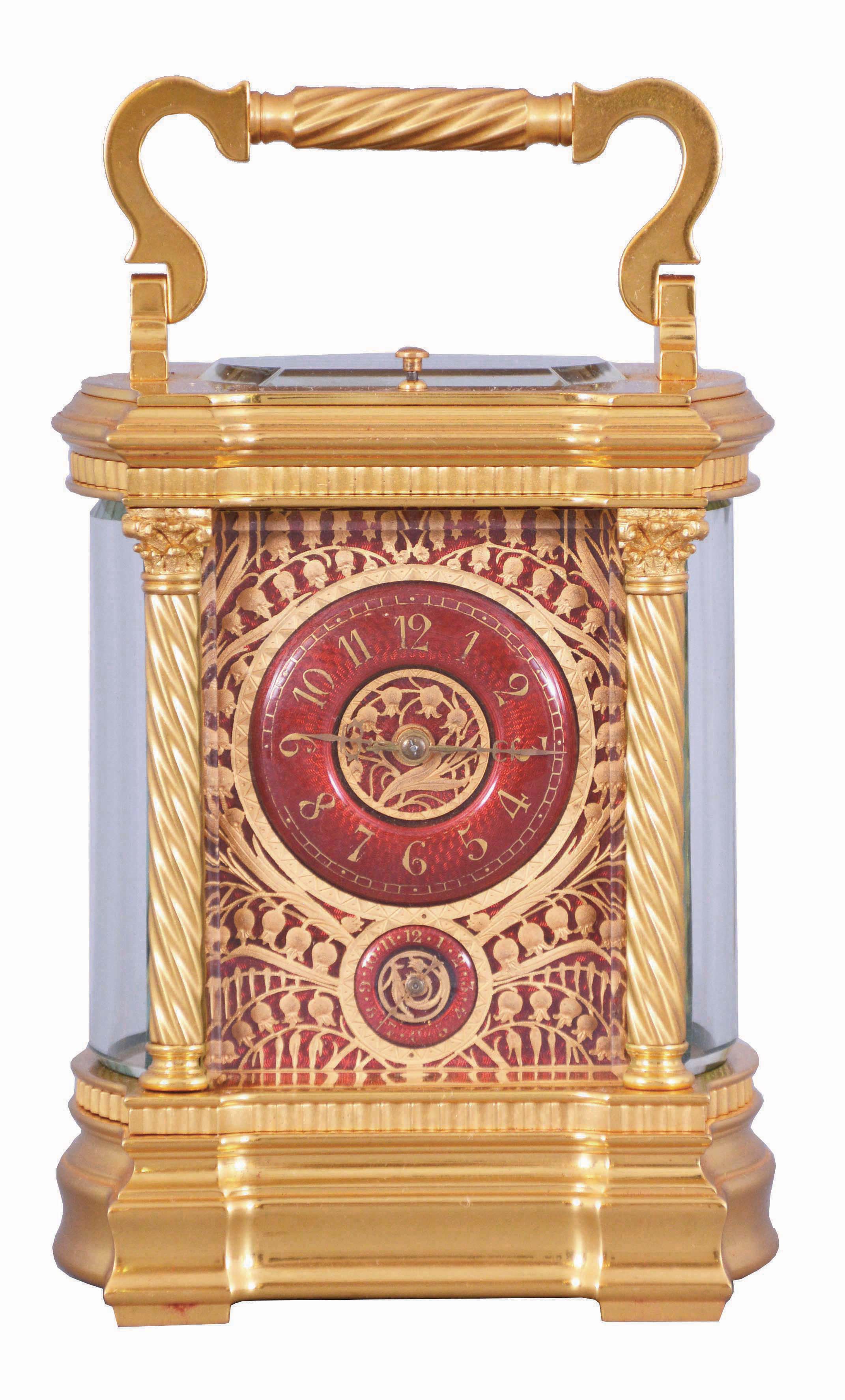 France, a large and extremely decorative carriage clock with grand sonnerie striking, unusual gilt Anglaise variant case with twist columns having Corinthian capitals and turned bases, the molded base and cornice with bowed sides and conforming beveled glasses, top with twist ornamented handle matching the columns, red guilloche enamel dial with convex chapter and gilt Arabic numerals, ornate pierced and chased, gilt dial mask with lily of the valley ornament, gold hands, 8 day time, strike, and alarm movement with lever platform and cut bimetallic balance, sounding grand or petit quarters in passing, and repeating the last hour and quarter on demand, serial #1304, with original leather bound box and key — Antique Clocks Price Guide