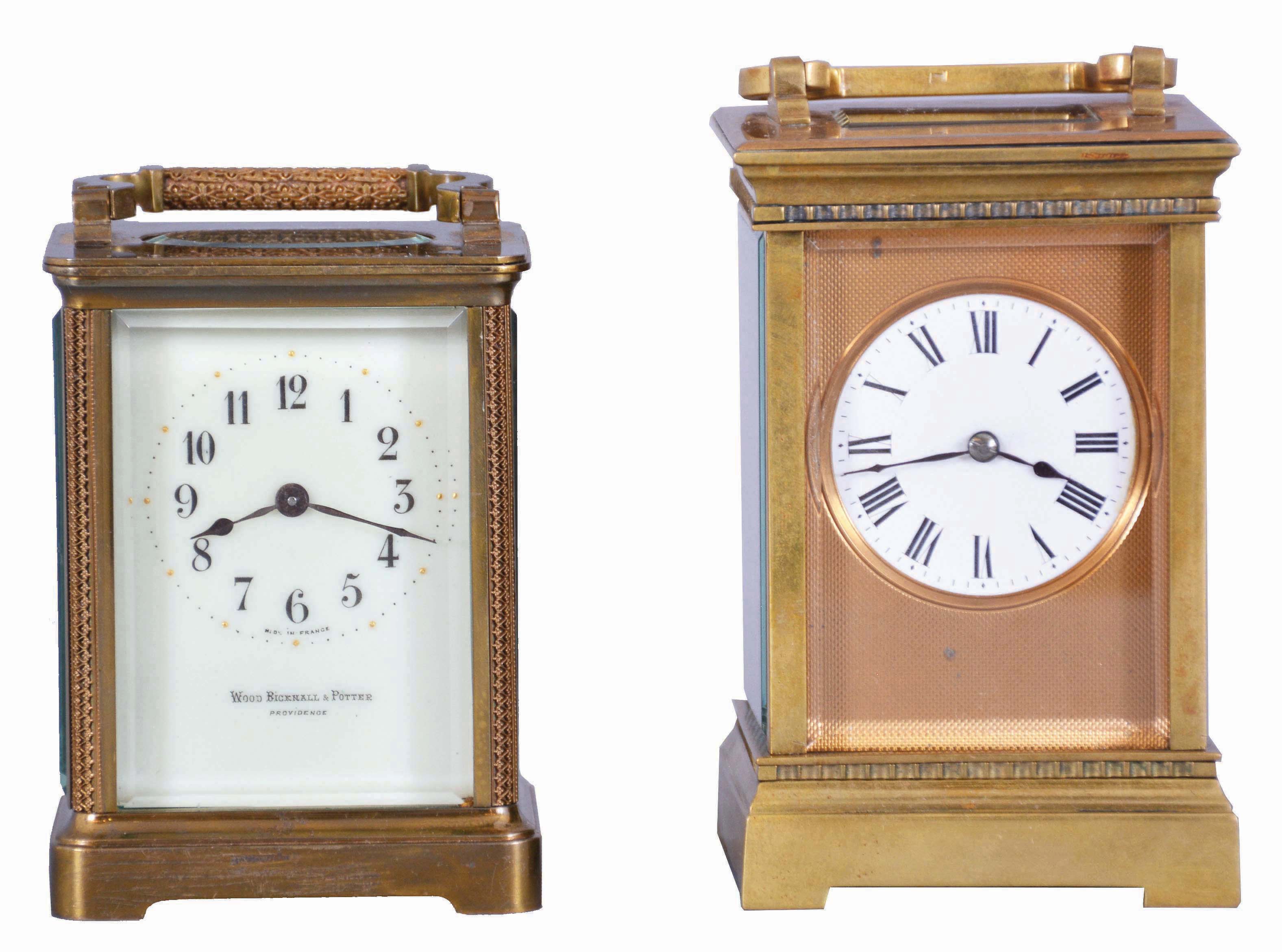 Clocks- 2 (Two) Carriage, both French 8 day timepieces: (1) gilt Anglaise case, Roman numeral white enamel dial with engine turned, gilt mask, and lever platform; (2) fret ornamented Obis case, Arabic numeral white enamel dial signed "Wood, Bicknell & Potter, Providence", with cylinder platform — Antique Clocks Price Guide