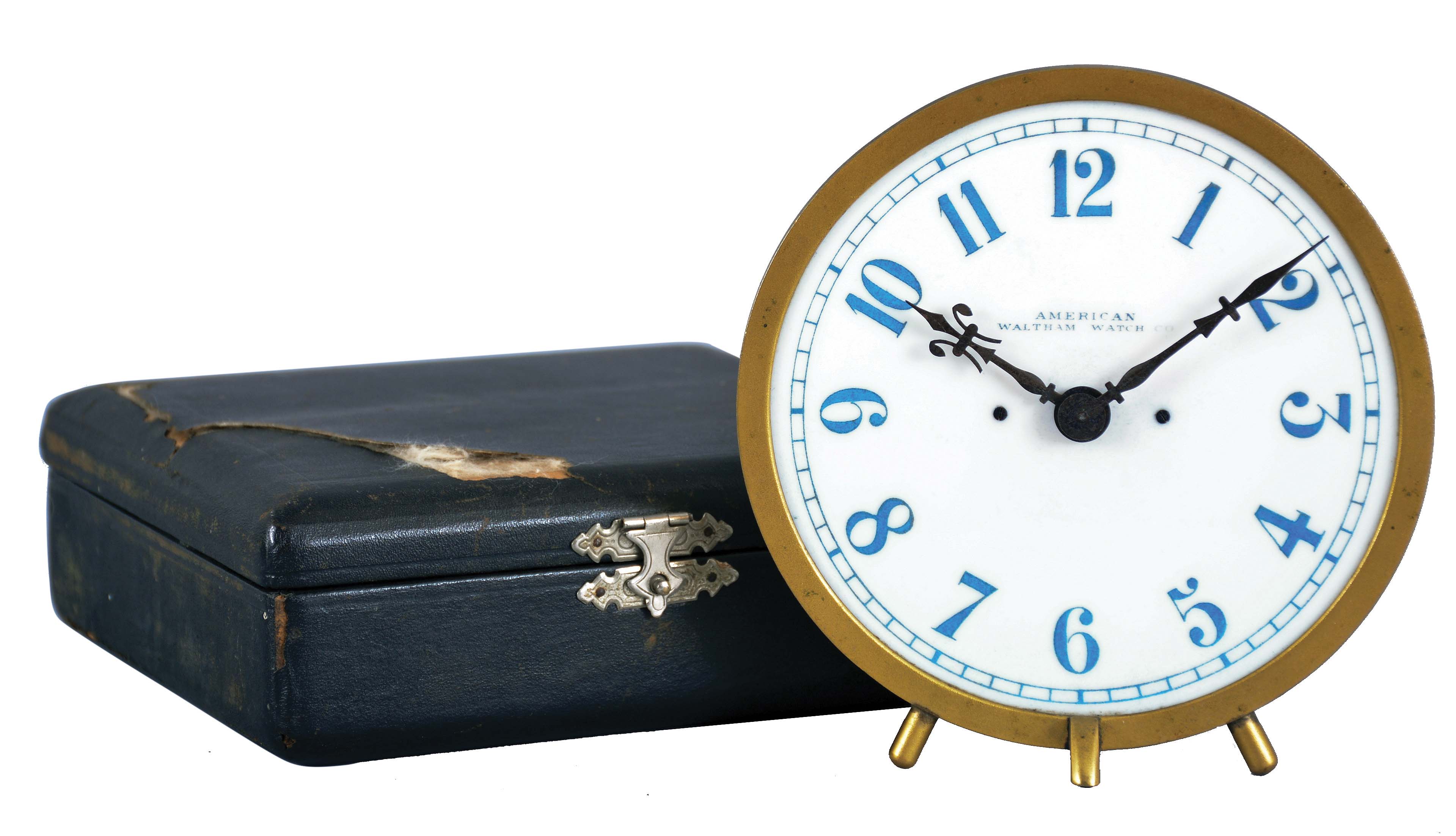 American Waltham Watch Co.,Waltham, Mass., night clock with travel case, 7 jewel gilt lever movement, signed, Arabic numeral milk glass dial with blued steel hands, gilt bezel and gas jet mounting bracket for night illumination, with leather clad, velvet lined wooden case — Antique Clocks Price Guide