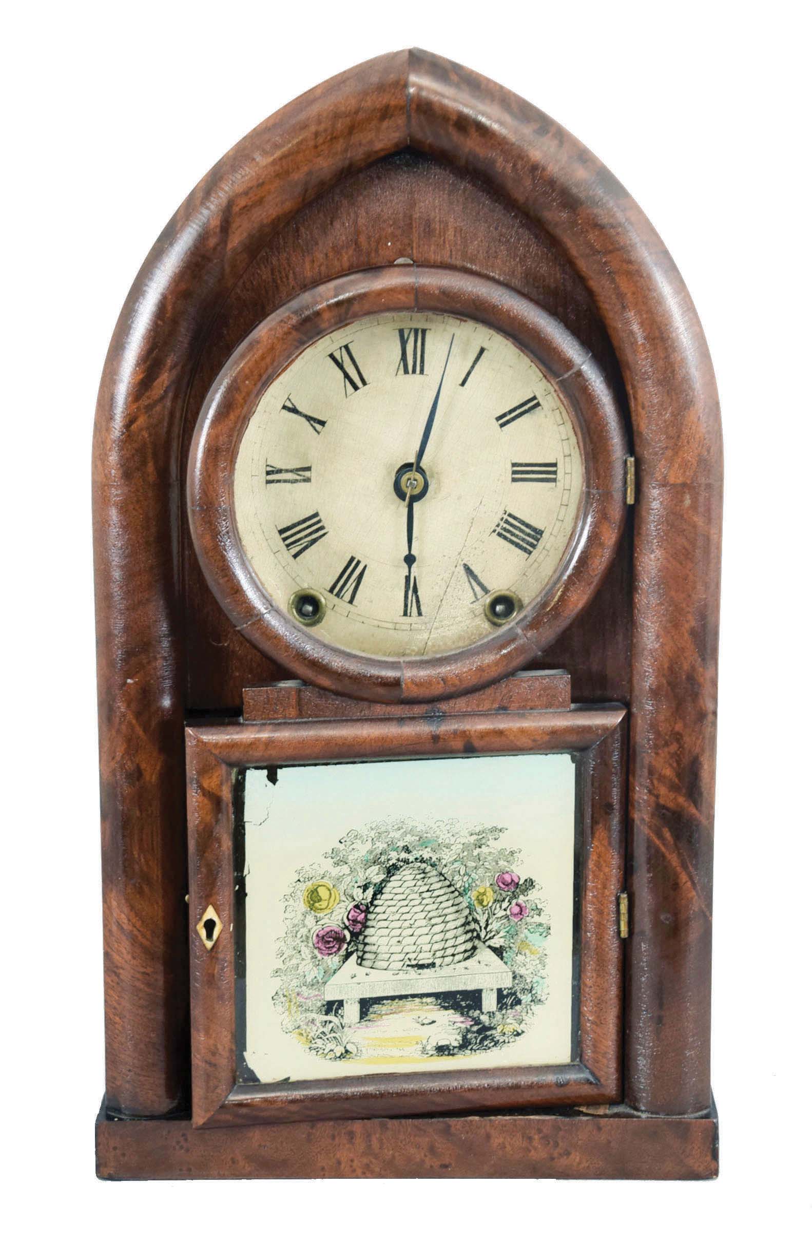 Brewster & Ingrahams, Bristol, Conn., 8 day, time and strike, spring brass movement round gothic or beehive clock. — Antique Clocks Price Guide