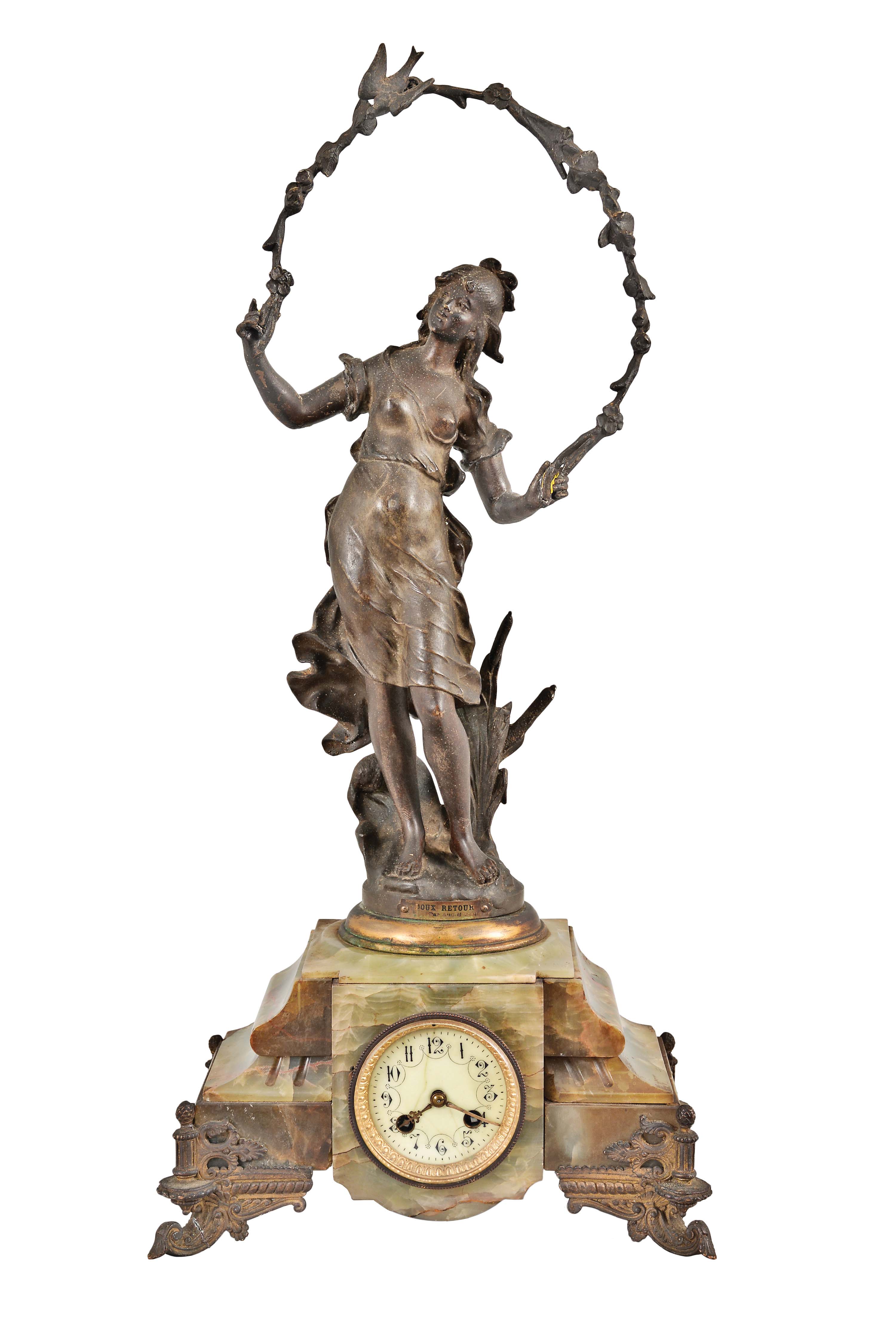 France, Green Onyx Figural Clock, with cream colored arabic numeral dial set within a brass bezel with beveled glass, patinated spelter young lady figure titled "Doux Retour" or Sweet Return celebrating the annual rite of spring with the figure holding a garland of flowers with a perched bird standing above the dial, green onyx multi-part case on cast and gilt classical feet, round eight day French time and strike, spring powered movement with coiled gong for hour strike and pendulum. — Antique Clocks Price Guide