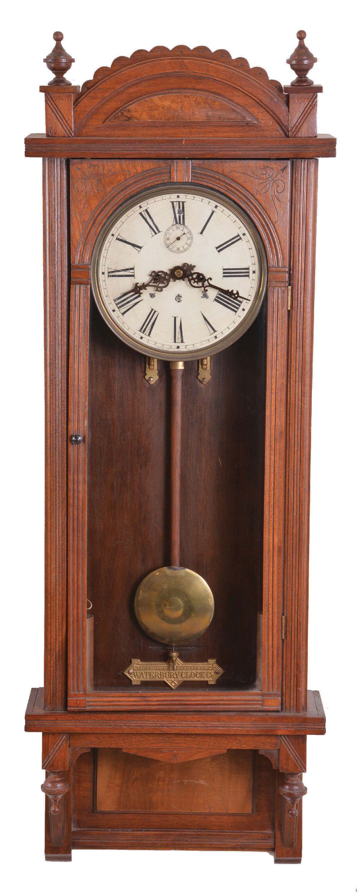 Waterbury Clock Co., Waterbury, Conn., "Regulator No. 3", two-weight, wall hanging timepiece, in a walnut case. — Antique Clocks Price Guide
