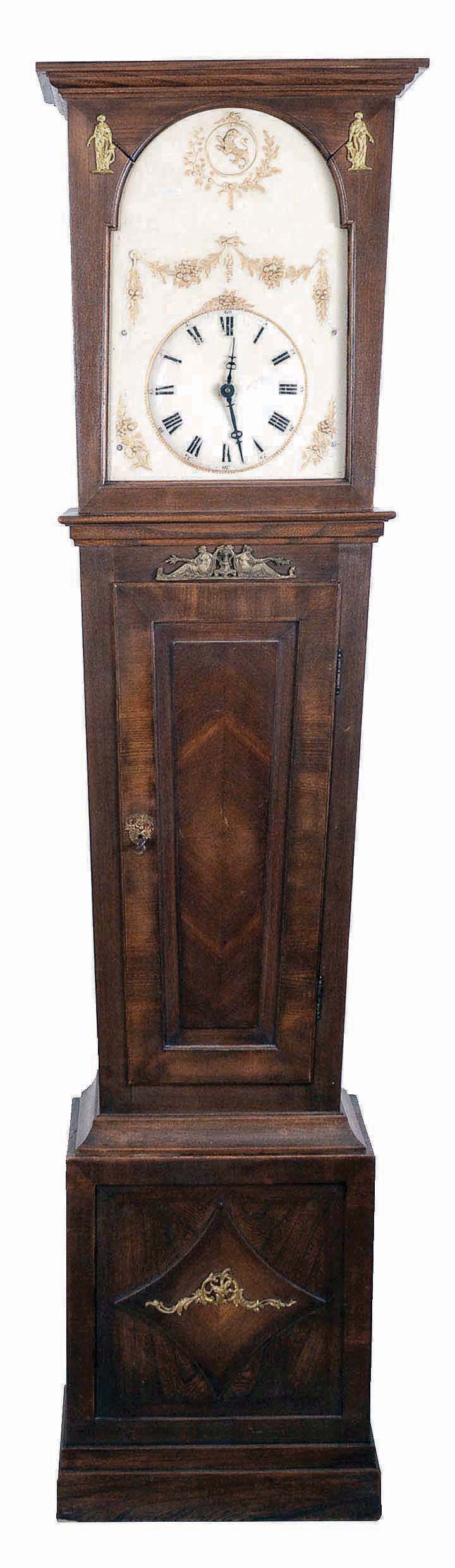 Germany, a Black Forest musical tall clock, 30 hour, time, strike and playing music on 21 pipes, three weight driven movement in a custom made oak case with brass appliques and a painted wooden dial featuring rampant lion in arch. — Antique Clocks Price Guide