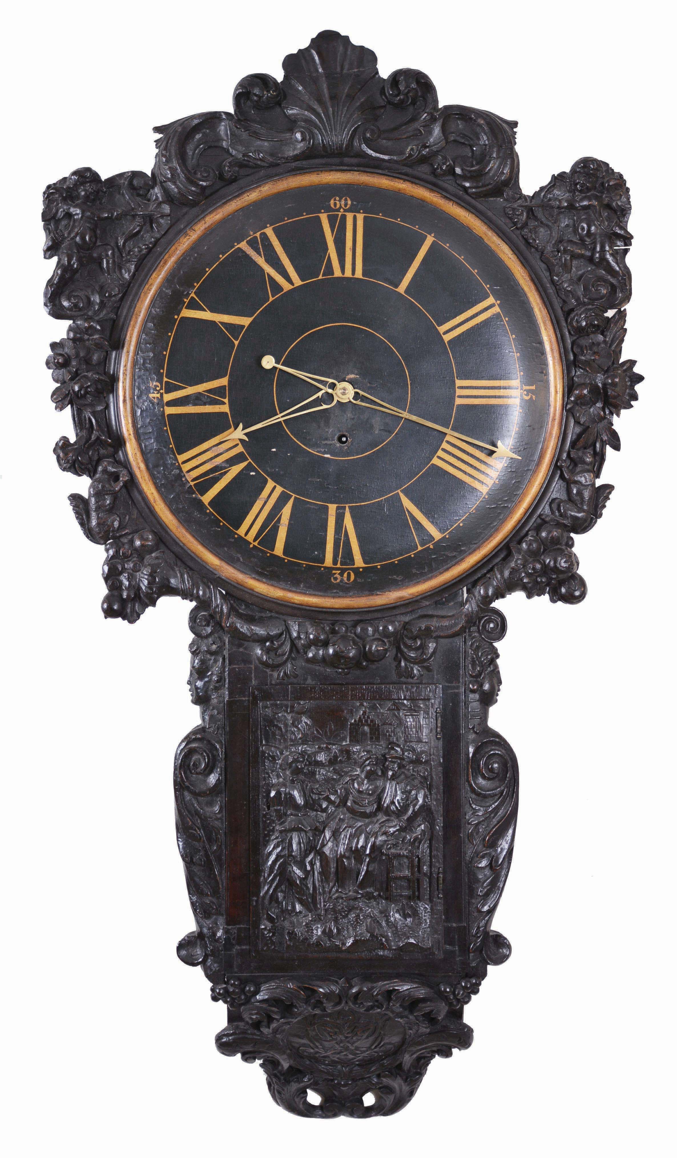 J. Thwaites, London, a large and impressive Act of Parliament or tavern clock, oak and mahogany case with carved dial surround featuring various flora and fauna, flanking cupids, and surmounted with acanthus and scallop shell ornament, the door with carved genre scene, sides with half caryatids, and base with acanthus surrounding a laurel wreath, dial with gilt Roman numerals and pierced brass hands, large, 8 day, 5 pillar timepiece movement with tapered plates, the front plate marked "I. Thwaites" and "1380", brass clad pendulum with wire rod and cylindrical lead weight — Antique Clocks Price Guide