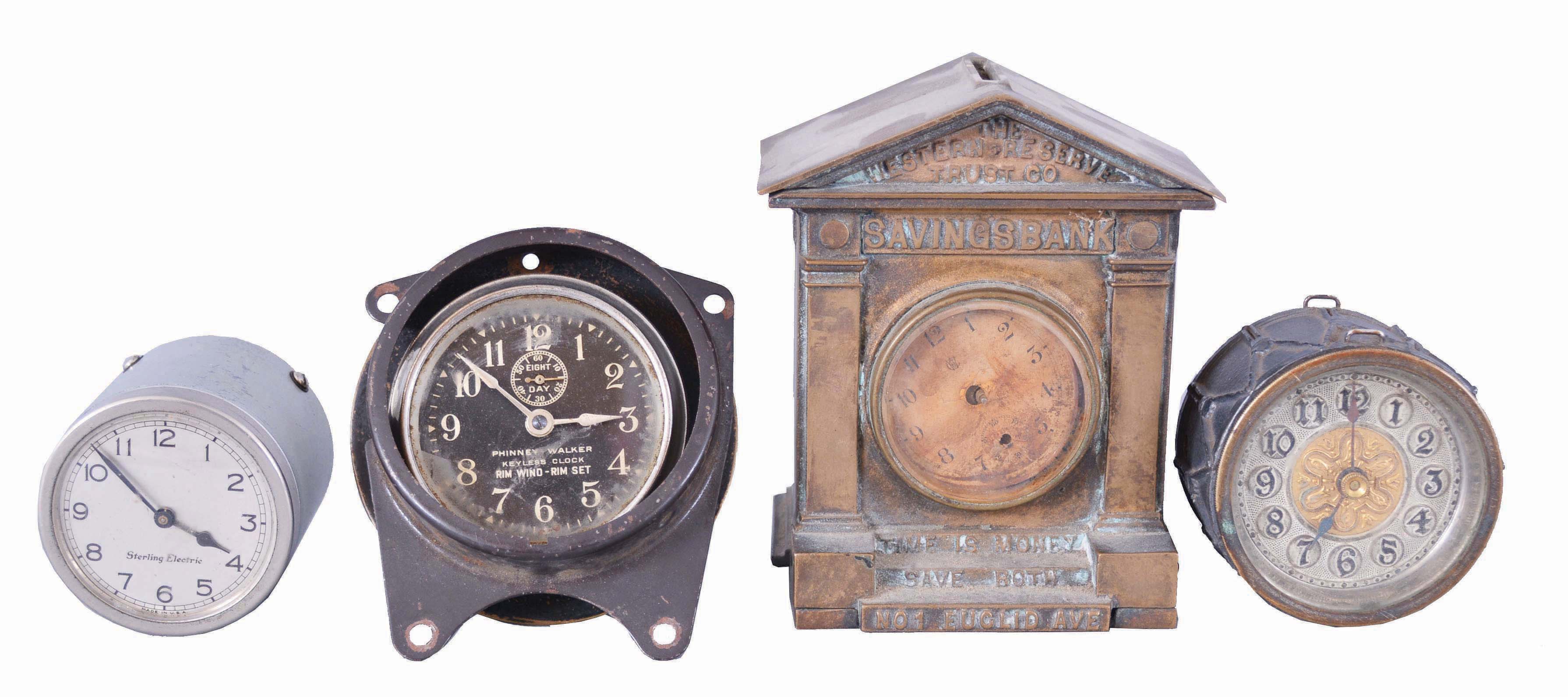 Clocks- 4 (Four) Novelty: partial clock in the form of a drum, Waterbury "Western Reserve Trust Co." novelty clock and coin bank, Sterling Clock Co. electric car clock, and Phinny-Walker "Keyless Clock" with rim wind and rim set. — Antique Clocks Price Guide