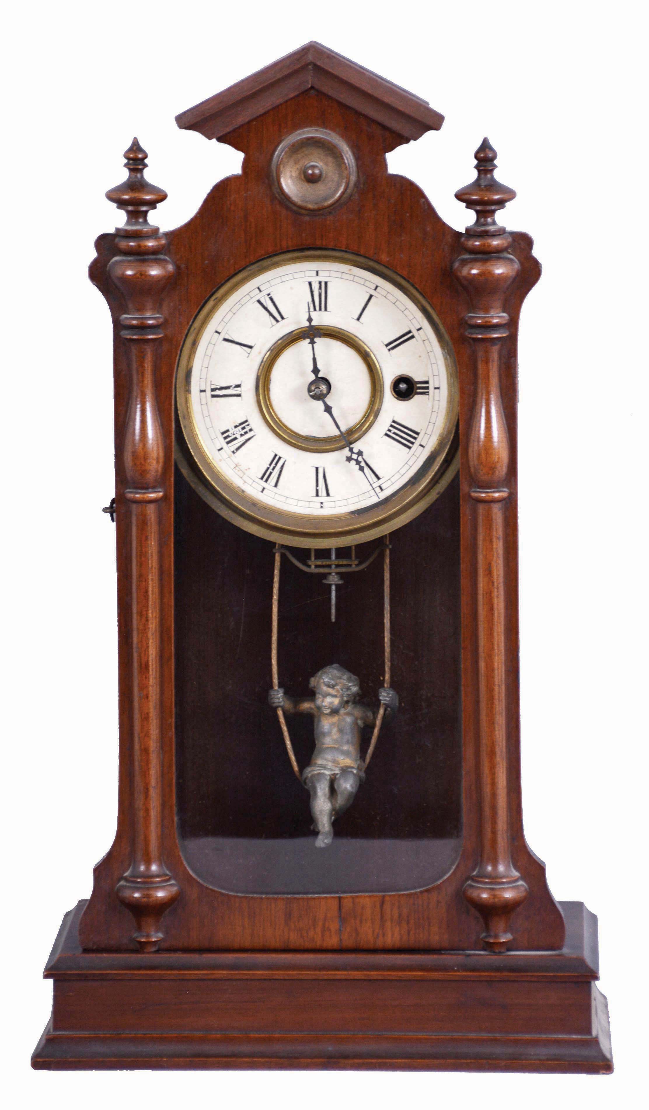 F. Kroeber Clock Co., New York, "Angel Swing No. 1" shelf clock with a spring driven, 8 day timepiece movement in a walnut case. — Antique Clocks Price Guide