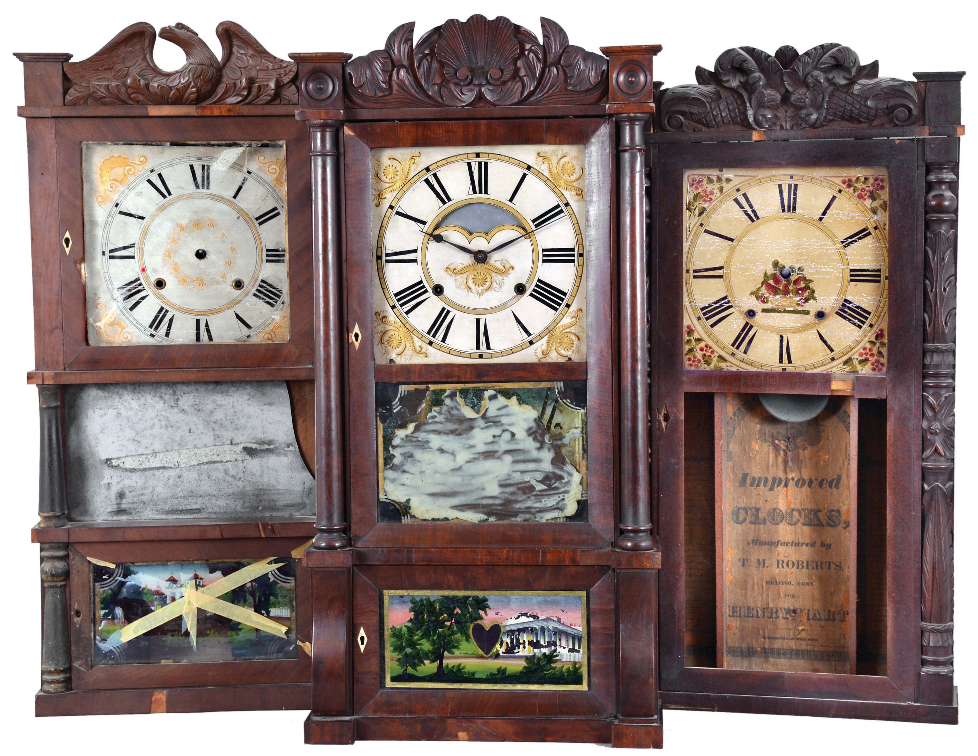 Clocks- 3 (Three): American shelf clocks: (1) Jared Arnold, Jr., Amber, NY, triple decker shelf clock with a weight driven, 8 day, time and strike strap brass movement in a mahogany veneered case with a carved eagle splat., c 1838; (2) T. M. Roberts (for Henry Hart), Bristol, Conn., carved column and splat shelf clock with a weight driven 30 hour time and strike wood movement in a mahogany veneered case, c1835. (3) Birge & Gilbert, Bristol, Conn., full column and carved splat shelf clock with a weight driven, 8 day, time and strike strap brass movement in a mahogany veneered case, c1838. — Antique Clocks Price Guide