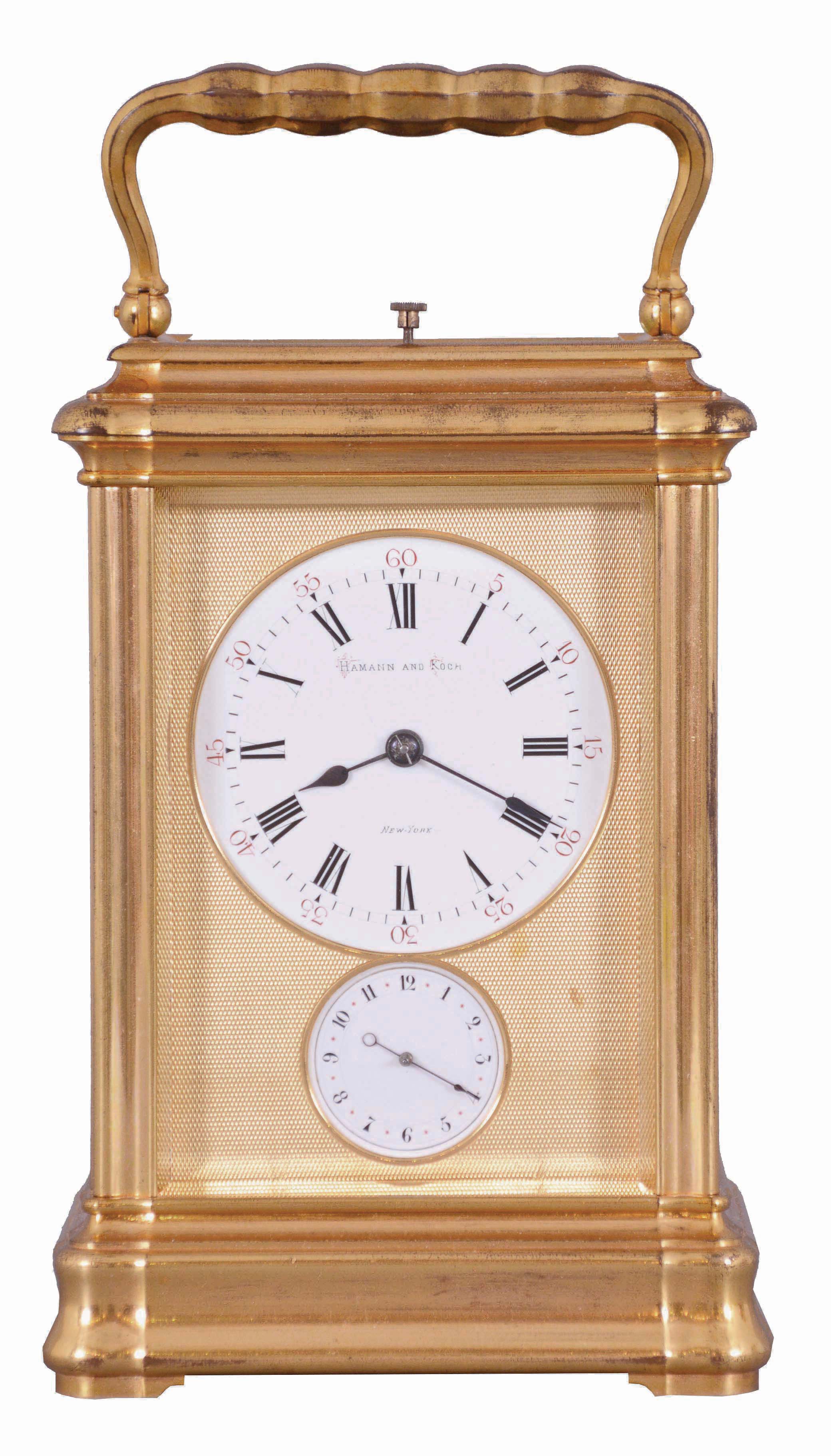 Drocourt, Paris, for Hamann & Koch, New York, an impressive, Gorge cased, grand sonnerie striking giant carriage clock, the massive gilt case with bevelled glasses, the top glass with engine turned mask with an oval aperture for viewing the escapement, Roman numeral white enamel dial also with gilt, engine turned mask, blued steel spade hands, 8 day time, strike, and alarm movement with large lever platform and cut, bimetallic balance, sounding grand or petit quarters in passing, and repeating the last hour and quarter on demand, the front plate marked "H.L.", gong bases marked "F.D." within an oval, serial #1813 — Antique Clocks Price Guide