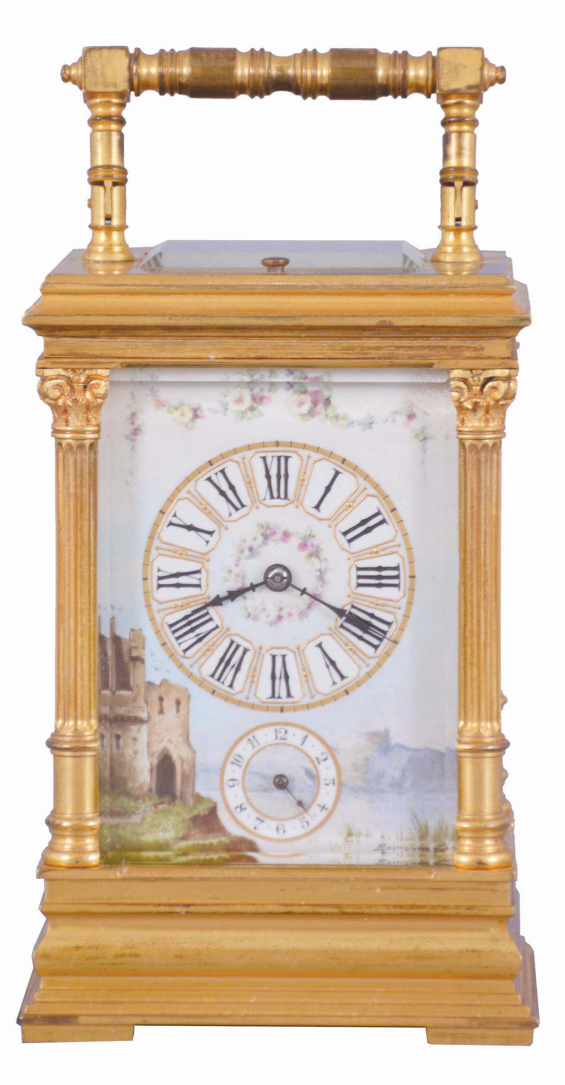 France, for the English market, a fine Pillars style repeating carriage clock with porcelain panels by Lucien Simonnet, the gilt case with stepped, molded base, the corners with fluted columns and Corinthian capitals supporting the molded cornice, the folding handle with turned ornament, case sides set with signed, polychrome enamel scenes depicting colorfully dressed young women in a garden, the Roman numeral dial surrounded by a landscape scene with castle ruins and floral garlands, blued steel distaff hands, 8 day time, strike, and alarm movement with lever platform, and repeating the last hour on demand, serial #2277 — Antique Clocks Price Guide