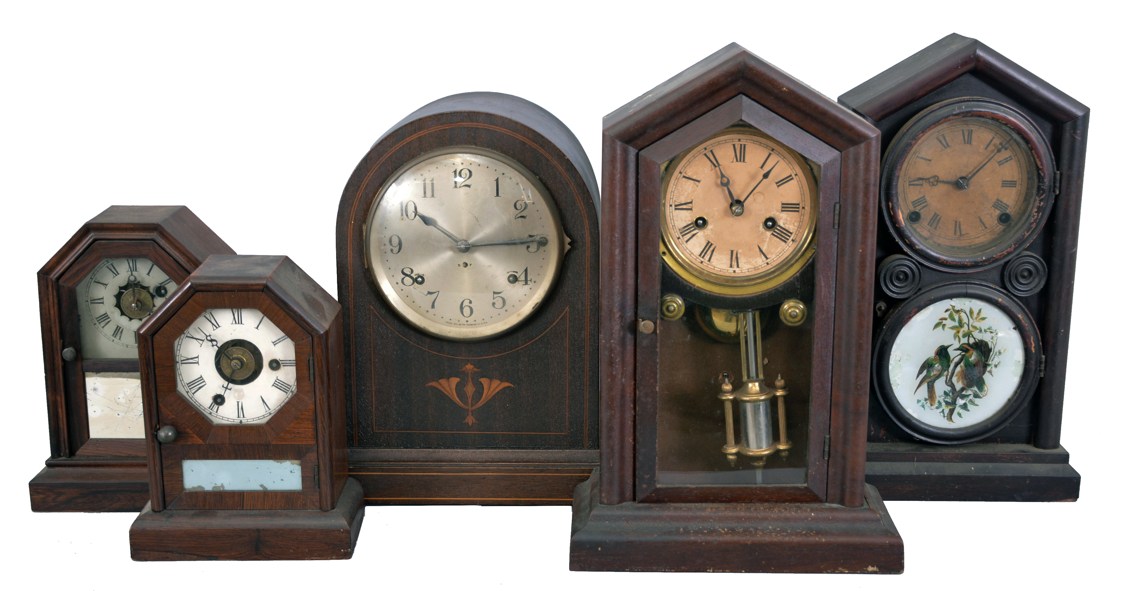 Clocks- 15 (Fifteen) American and European shelf clocks: including a Seth Thomas "Sonora" chime clock, two 30-hour cottage clocks, two Ingraham "Doric" clocks, a Junghans electro-mechanical clock, a brass-cased French clock sold by Tilden Thurber Co., a weight driven ogee clock, a sharp gothic clock, a French time-only mantel clock, a modern chiming bracket clock, two 30-hour clocks by Chauncey Jerome, a small pillar & scroll clock, and a wall clock by the Self-Winding Clock Company. — Antique Clocks Price Guide