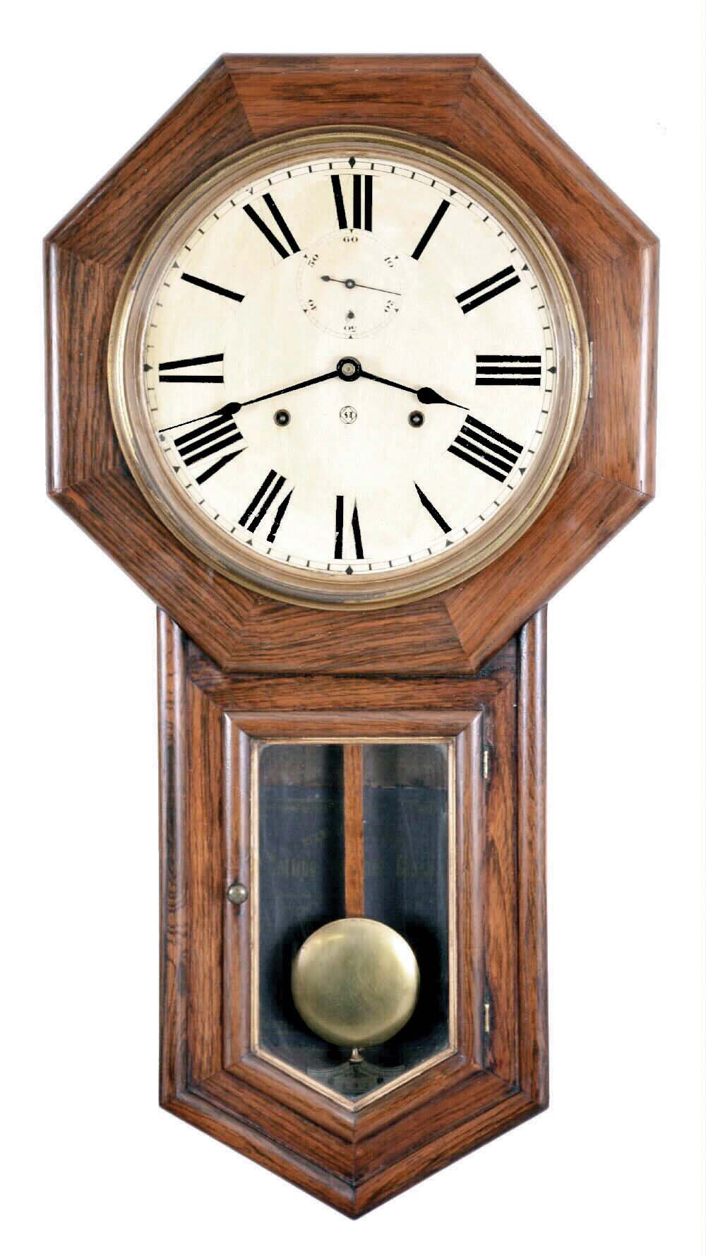 Seth Thomas Clock Co., Thomaston, Conn., "World" long drop octagon wall clock in rosewood, with double spring, 15 day movement with seconds bit below 12. — Antique Clocks Price Guide