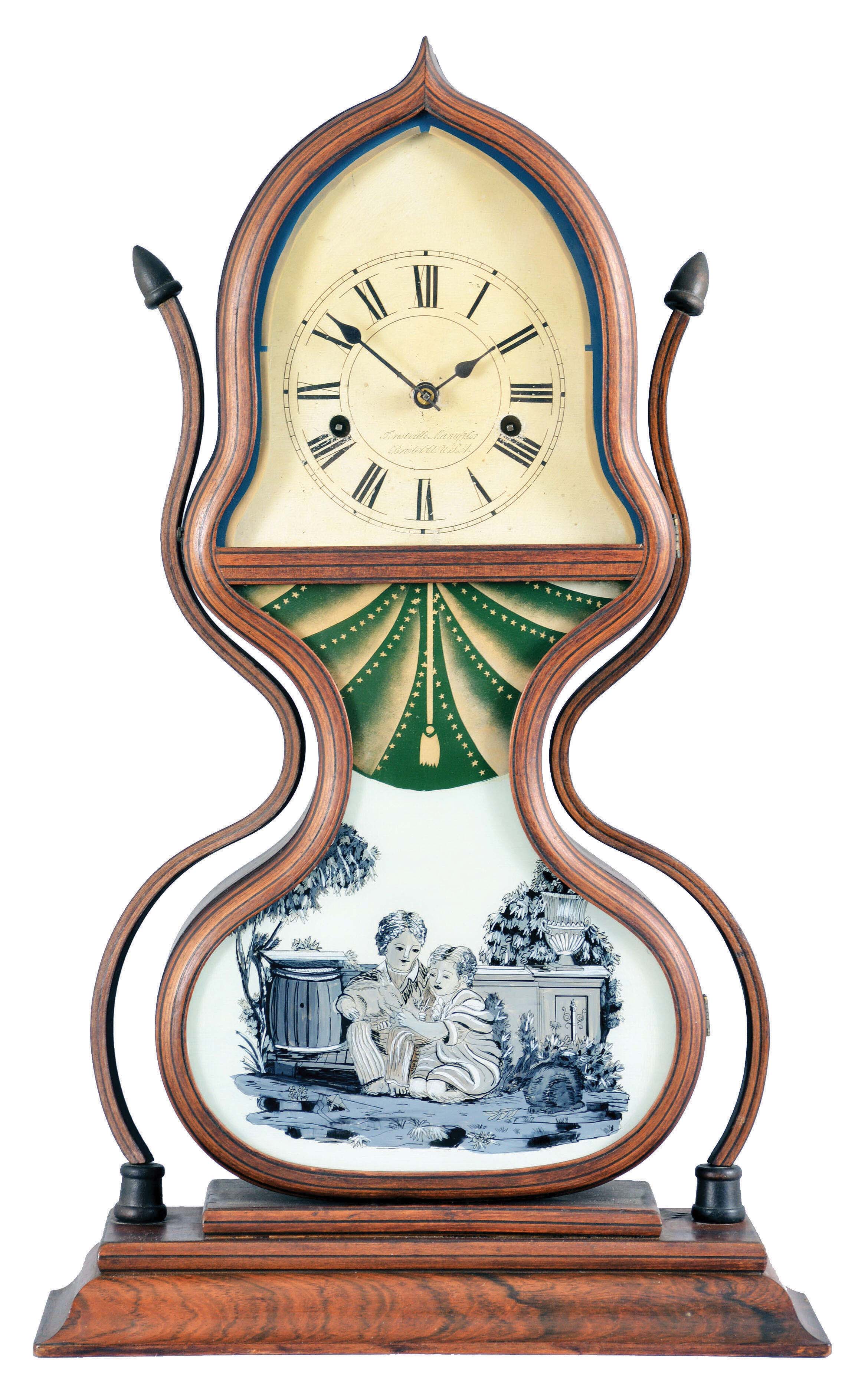 J. C. Brown, Forestville, Connecticut, acorn clock, rosewood veneered case with laminated, full-length door flanked by conforming laminated side ornaments capped with turned acorns, and framing a replacement tablet depicting two children playing with bunnies in a classical garden setting and beneath a theatrical curtain with stars in green and bronze paint, all on an ogee molded base, roman numeral zinc dial inscribed "Forestville Manufg. (sic) Co/Bristol. Ct. U.S.A.", chestnut backboard with pale green dust paper lining and card stock printed label stating "Eight Day Spring Clocks,/Manufactured by J. C. Brown,/Bristol, Conn." all within a pin-wheel border, eight day lyre shaped movement stamped "Forestville Mfg. Co./Bristol, Ct/USA" with count-wheel strike, recoil escapement and detached mounted springs and wooden fusees in the base below the card stock label. — Antique Clocks Price Guide