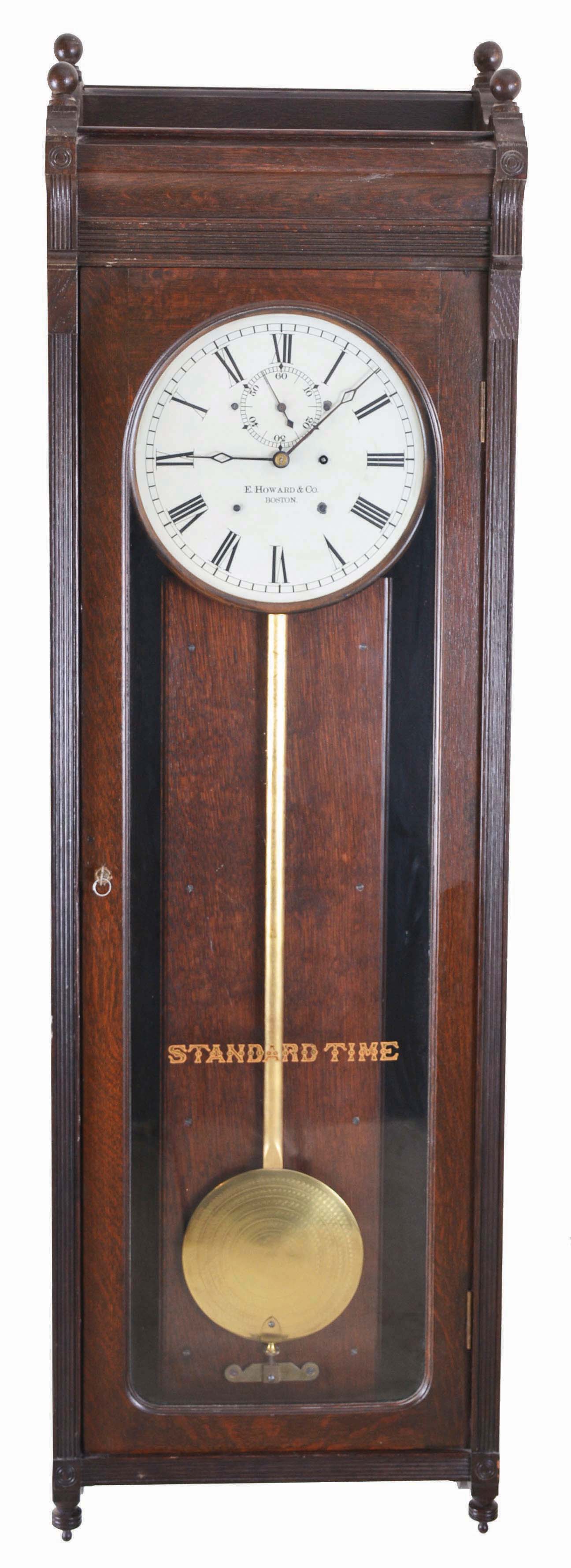 E. Howard & Co., Boston, Mass., "Regulator No. 89", wall clock, 8 day, time only weight driven movement in a oak case with 12 inch, Roman numeral painted dial — Antique Clocks Price Guide