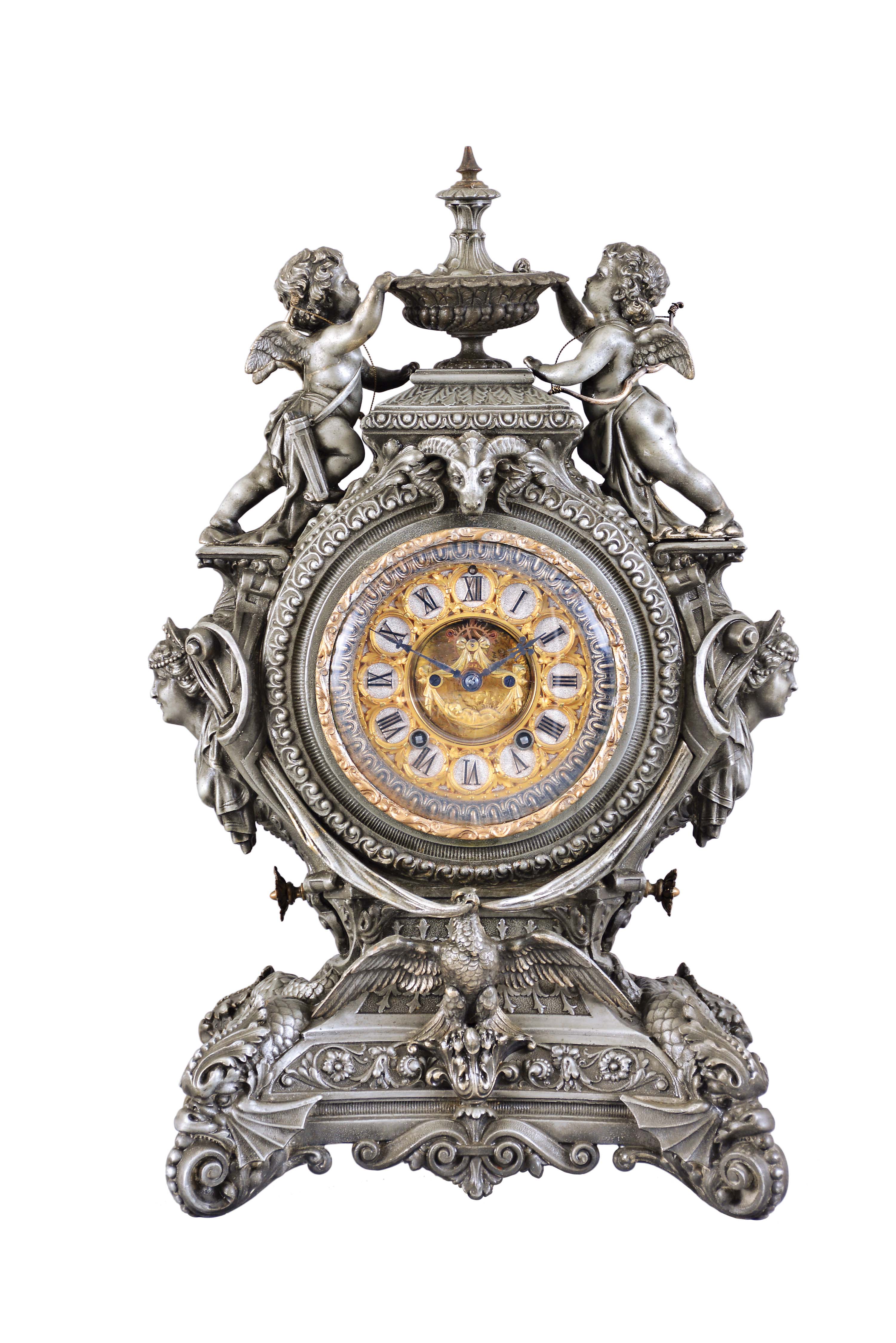 Ansonia Clock Co., New York, "Lydia", 8 day, time and strike, spring brass movement metal case figural mantel clock. — Antique Clocks Price Guide