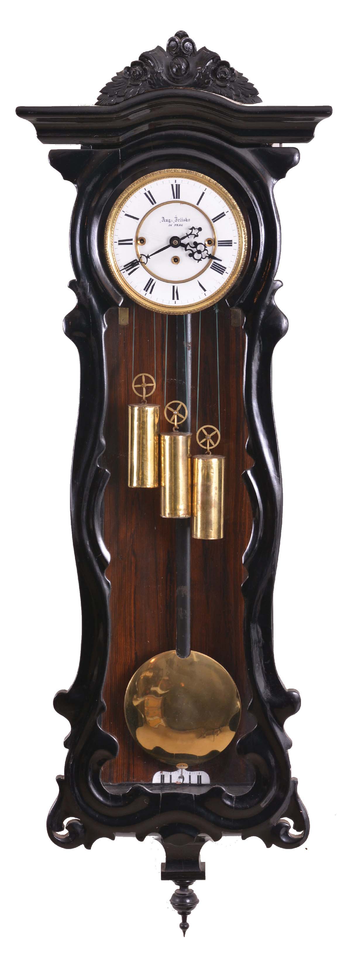 Austria, "Vienna" regulator, 3-weight, grand sonnerie, in an ebonized serpentine case, the white porcelain dial signed Aug. Belisko in Prag, and with embossed pattern brass bezel, and slide mount movement. — Antique Clocks Price Guide