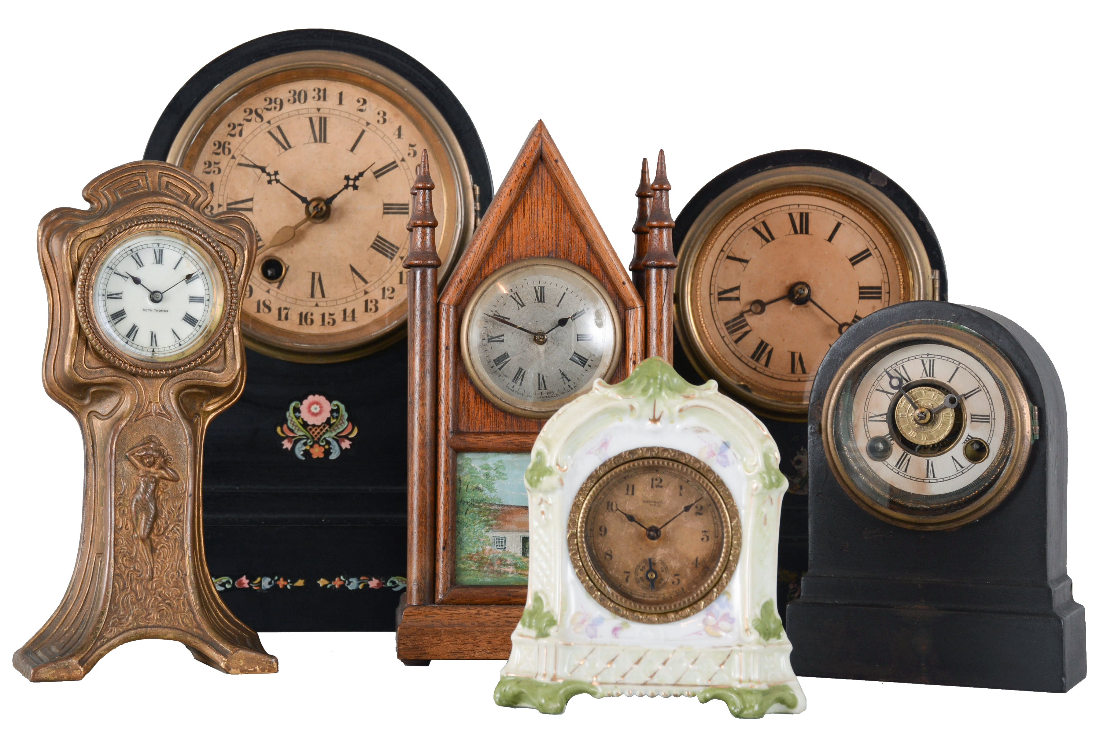 Clocks- 6 (Six) Shelf & Novelty: an assortment of small clocks including a Seth Thomas Art Nouveau novelty clock, miniature porcelain clock by New Haven, miniature steeple by Fynetone Co.,three round top iron case clocks in different sizes by The Terry Clock Company. — Antique Clocks Price Guide