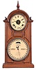 Ithaca Calendar Clock Co., Ithaca, New York, "No. 8 Shelf Library" double dial calendar clock with a spring driven, 8 day time, strike and alarm movement in a walnut case.