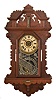 E. Ingraham & Co., Bristol, Conn., "? Drop", 8 day, time, strike and alarm spring brass movement wall clock. This premium model clock looks to be a variation on the "Amulet" mantel clock. There is a partial label that states this clock is manufactured exclusively for a company, but the name is difficult to read.