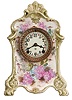 Ansonia Clock Co., New York, "La Farge" porcelain shelf clock with a spring driven, 8 day time and half hour gong strike movement in a Royal Bonn porcelain case.