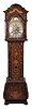 Thomas Watson, Haslingden, England tall clock, 8 day, time and bell strike, weight driven movement now in a Dutch marqueterie veneered bombay style case profusely inlaid with glazed aperture for pendulum bob on bun feet. The brass dial has a silvered chapter ring and silvered maker's boss above 12, cast brass spandrels and silvered calendar disk above 6.
