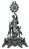 Regnault Fils, Chesnier & Sarrazin, Paris, a large figural mantel clock with front mounted pendulum, the bronzed spelter case with break front base on scroll feet, draped with foliate garlands, and further ornamented with masks, front with relief panel featuring recumbent, addorsed gryphons, and laurel molded, conforming plinth supporting a young male figure, the clock case surrounded by laurel fronds and held aloft in his left hand, a lyre in his right, with three disporting putti at his feet, patinated dial with applied, Roman numeral cartouches, pierced and engraved gilt hands, and with ornamental pendulum oscillating in front of the dial, signed, 8 day, time and strike pendule de Paris movement with Brocot escapement behind the back plate