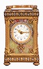 France, for Bailey, Banks & Biddle Co., Philadelphia, a very decorative striking carriage clock with original travel case, the gilt case with green onyx panels, top and base with gilt fret, the frets, handle and bezel set with brilliants, Arabic numeral white enamel dial with polychrome enamel floral garlands, gilt Louis XV style hands, 8 day, time and strike movement with lever platform counting the hours in passing, together with its original leather covered travel case and key
